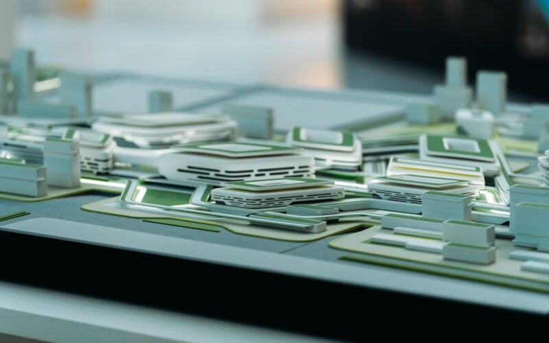 Close-up view of a futuristic architectural model showcasing urban design elements.